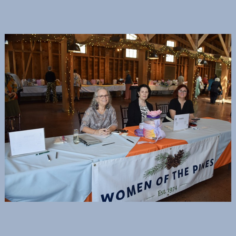 Brenda Sorrese, Marion Grote, and Callan Nagle raffle tickets and cashiers.